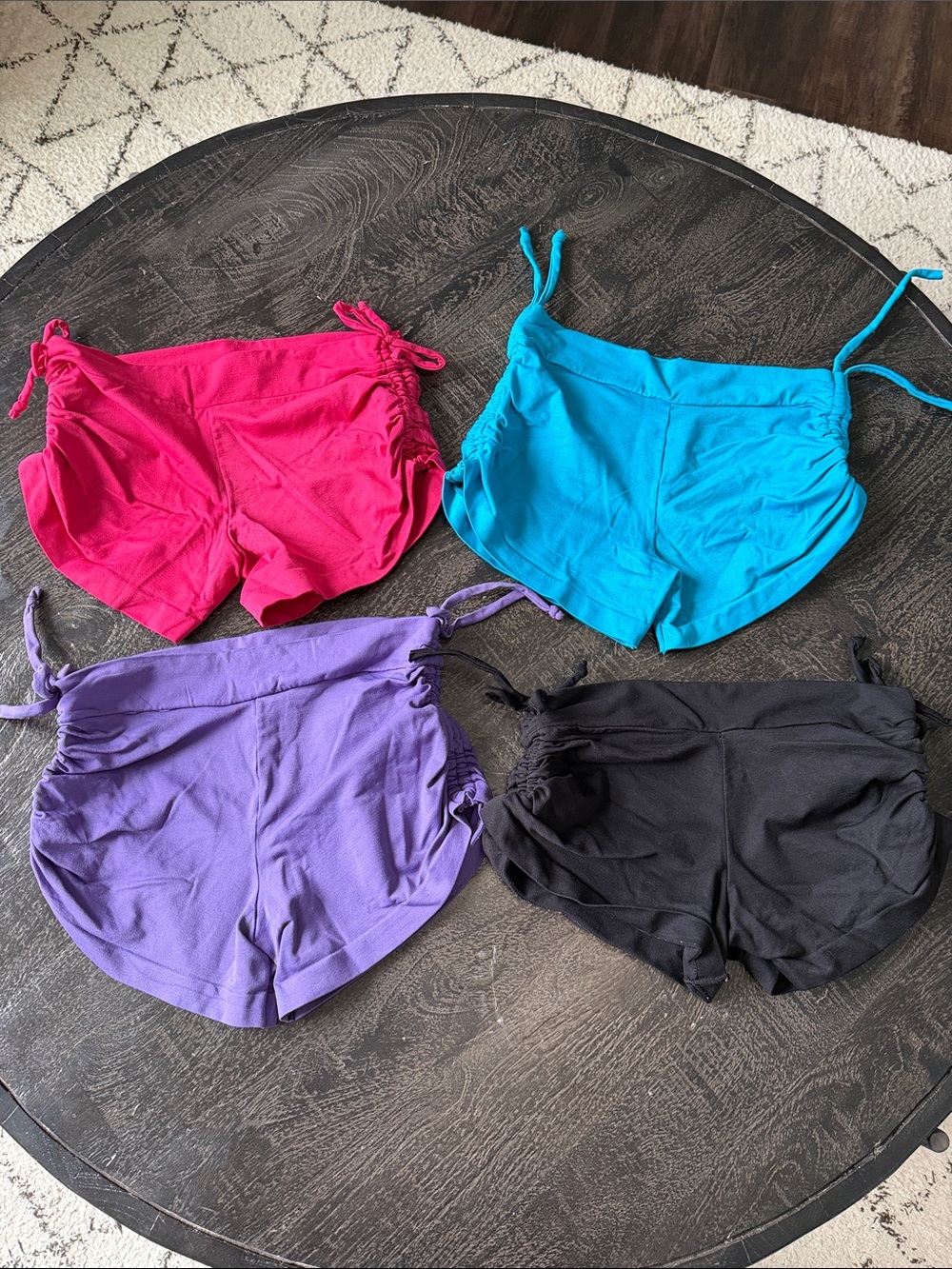 Set of Four Women's Lounge Shorts in Pink, Teal, Purple, and Black